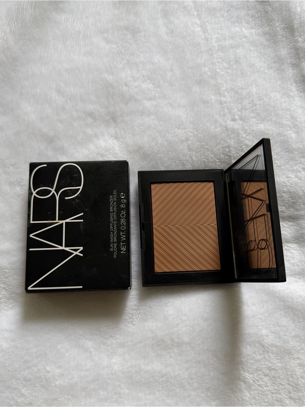 Discontinued NARS sunwash diffusing bronzer in Laguna